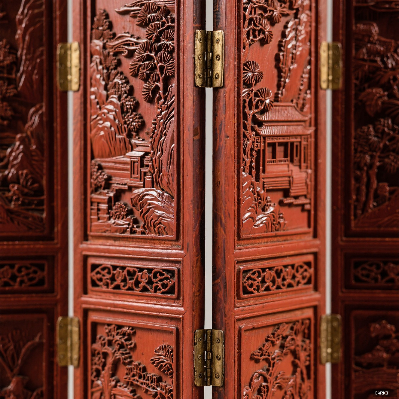 A detailed close-up of an antique Chinese Coromandel folding screen with carved…, featuring Chinese folding screens